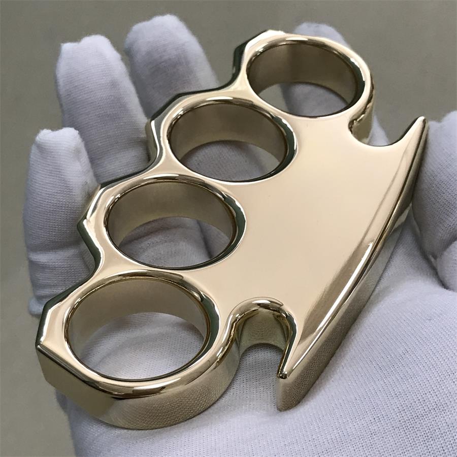 Classic brass knuckle duster as a collector display piece