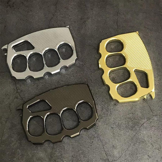 A thickened big-finger-hole solid brass knuckle duster, the cornerstone of a starter collection