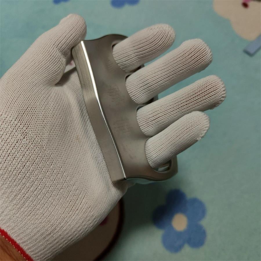 304 stainless steel knuckle duster close-up detail