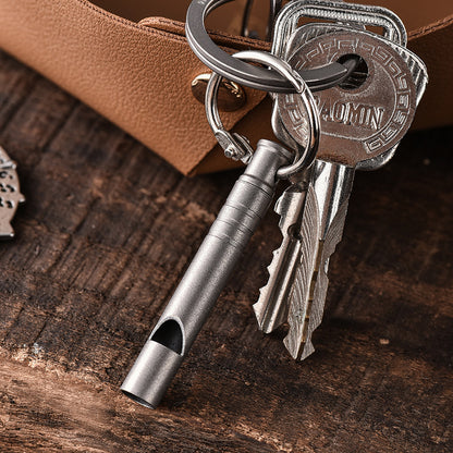 Decibel Defender: Titanium Whistle for Safety & Training