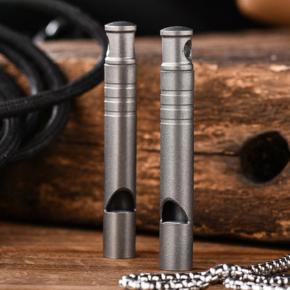 Decibel Defender: Titanium Whistle for Safety & Training