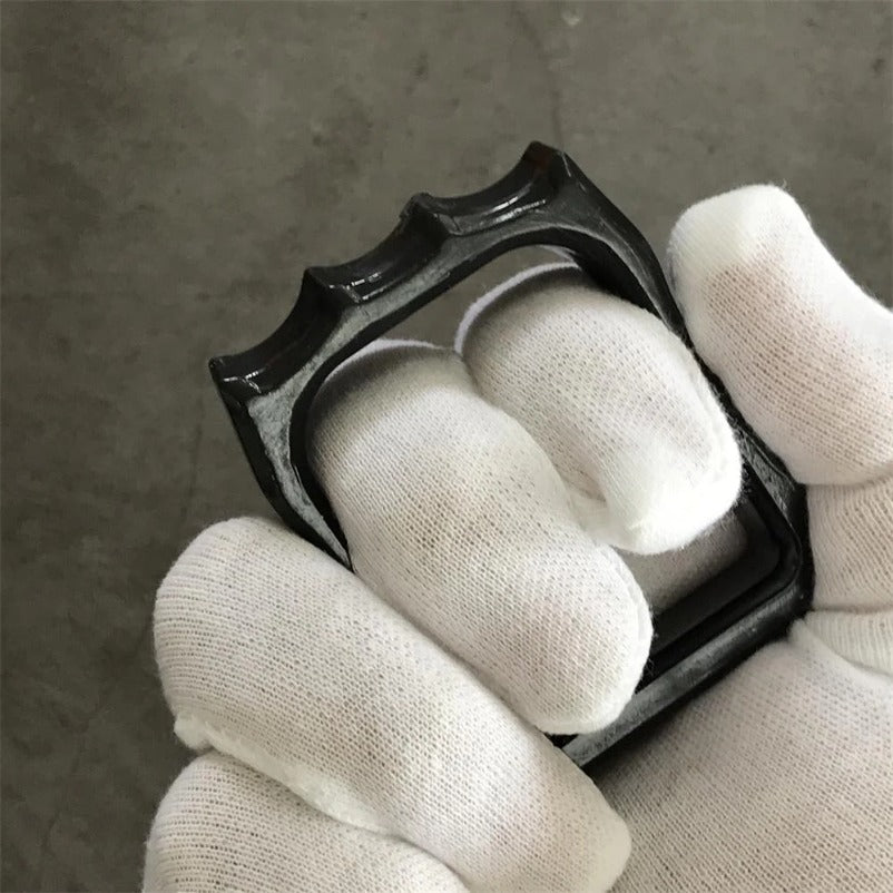 Compact Guardian: Two-Finger Knuckle Duster for Swift Self-Defense