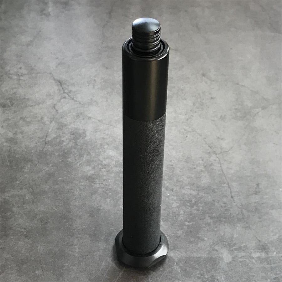 Single telescopic baton standing upright in retracted position